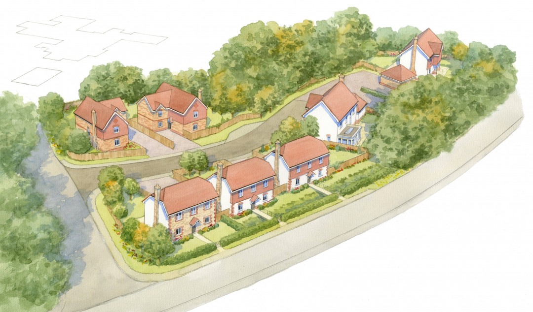 Aerial view of small housing development on country lane